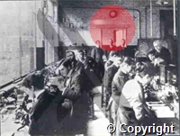 Manson lecturing in the original laboratory of the London School of Tropical Medicine