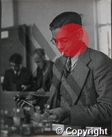 Staining a blood film for microscopic examination, Dr MBR Urs at work in the lab