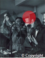 USA: Dr Gertrude Long (left) estimates a blood content with a Canadian colleague, Dr Botham