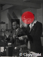 Students working in laboratory, Dr E Petersen, from Denmark, on right